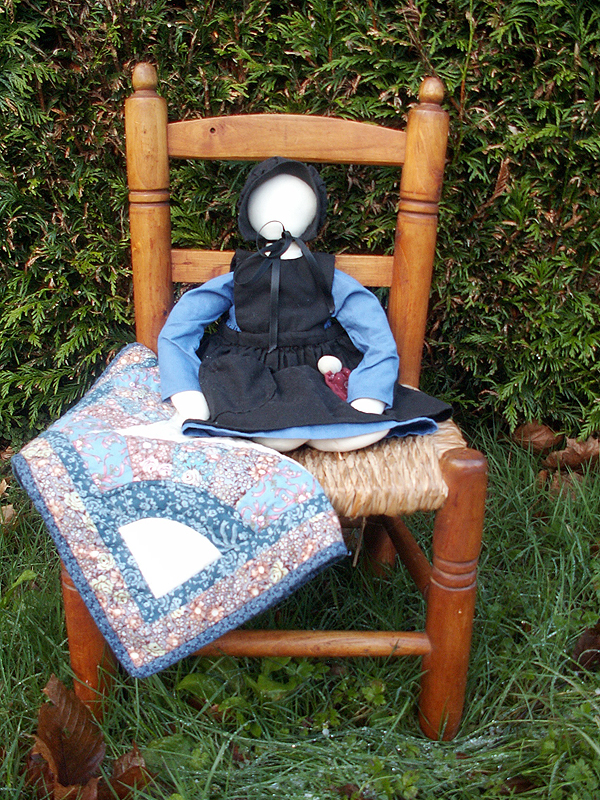Amish doll with patchwork and baby doll
